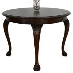 okrągły orzechowy stół kawowy